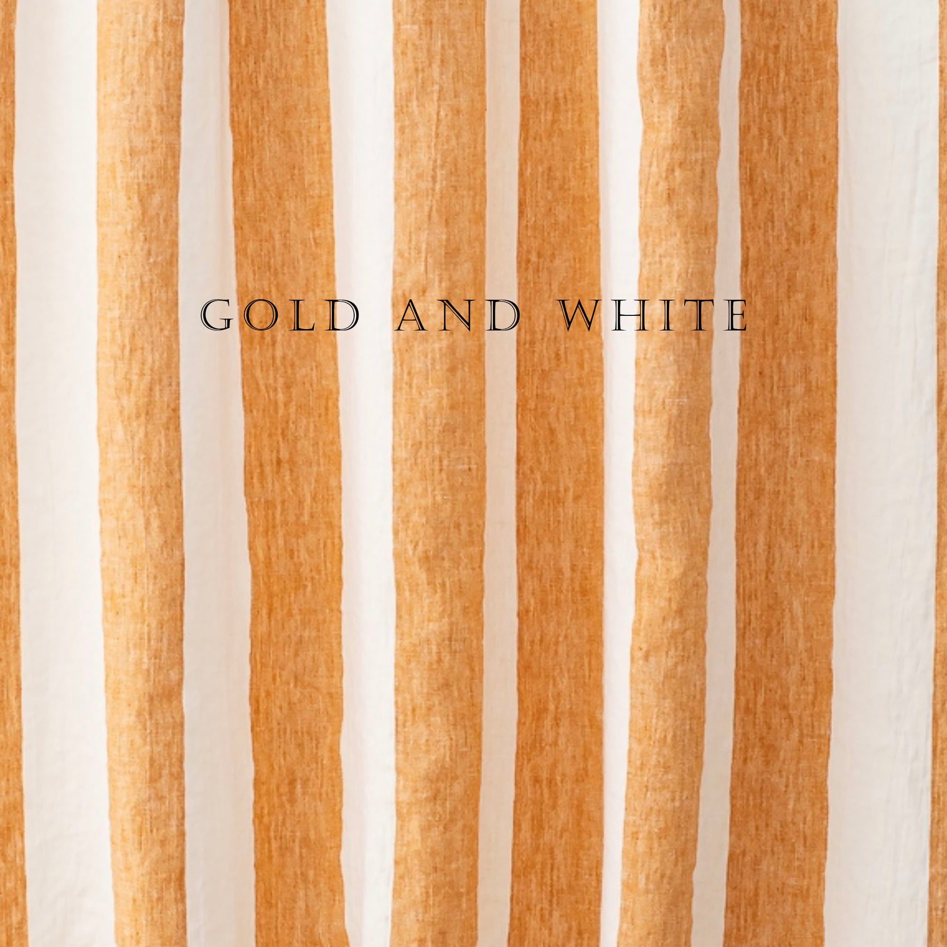 Striped fabric with gold and white vertical stripes on a plain background