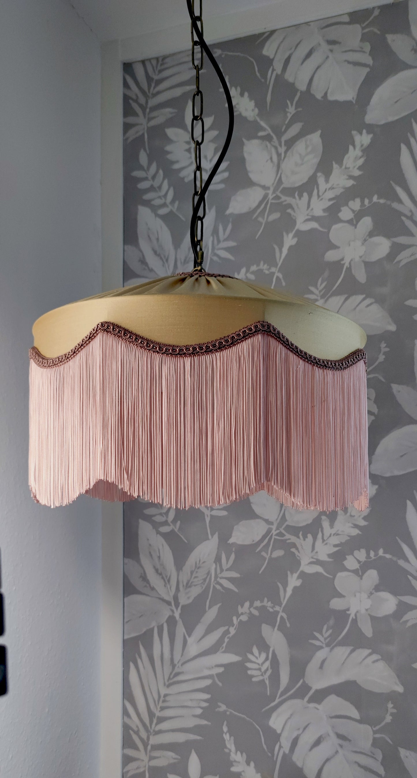 Gold silk fringed lampshade with blush fringe and trim, featuring an Art Deco scalloped design, ideal for vintage or luxury interior lighting.