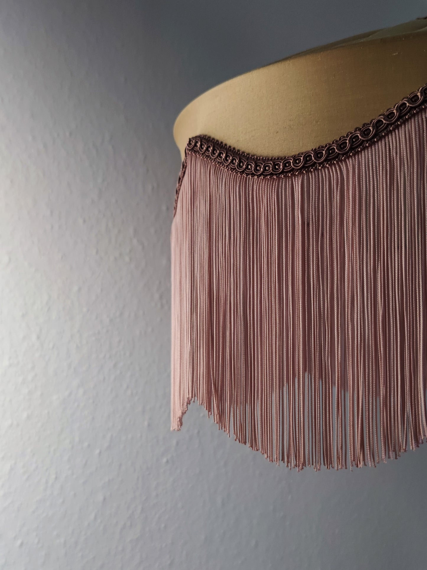Gold silk fringed lampshade with blush fringe and decorative trim, ideal for Art Deco-inspired luxury lighting in elegant home interiors.