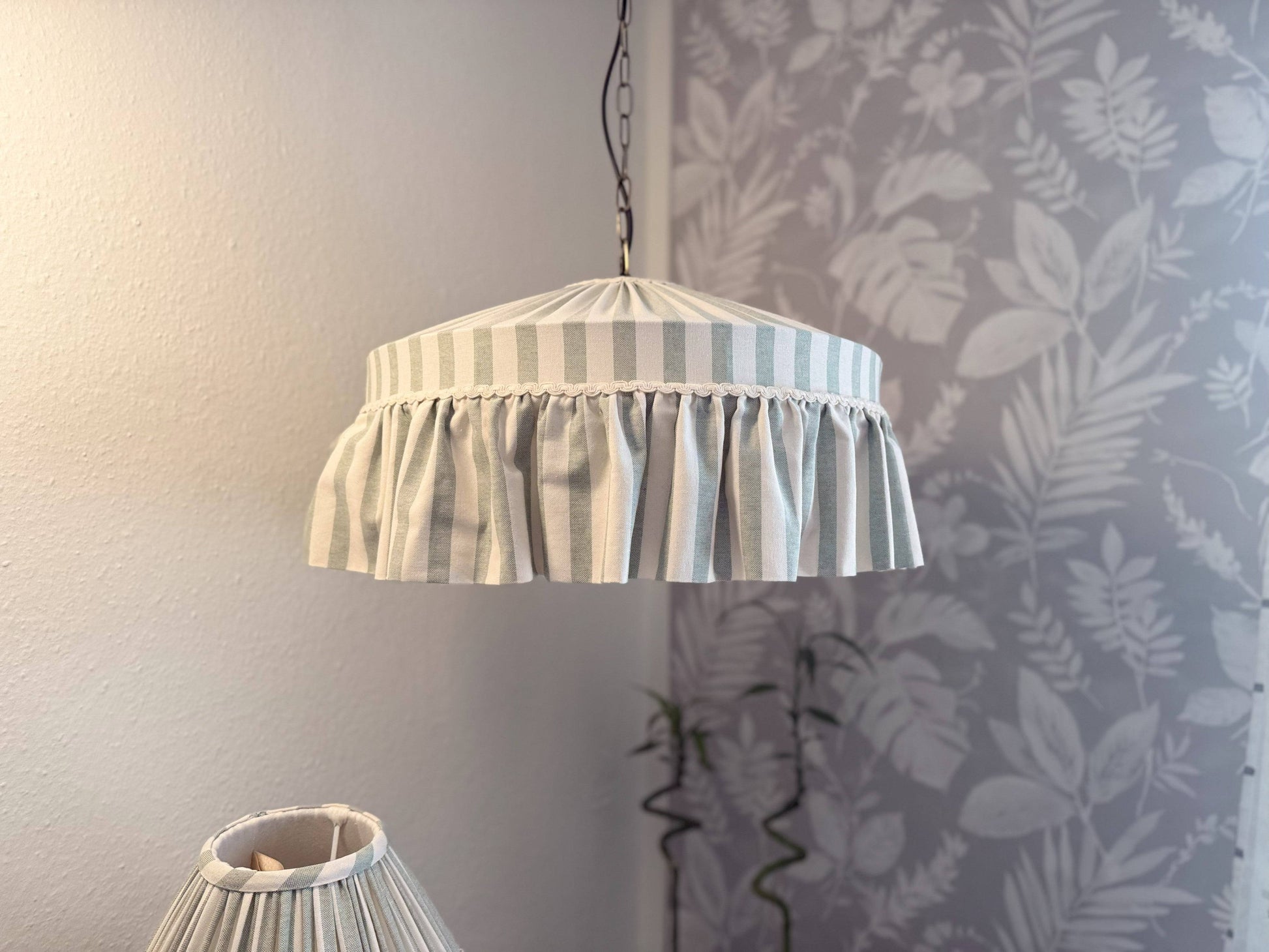 Ruffle Mint Green Wide Stripes Cotton Lampshade hanging as a ceiling pendant, ideal for romantic or cottagecore interiors in home lighting décor.