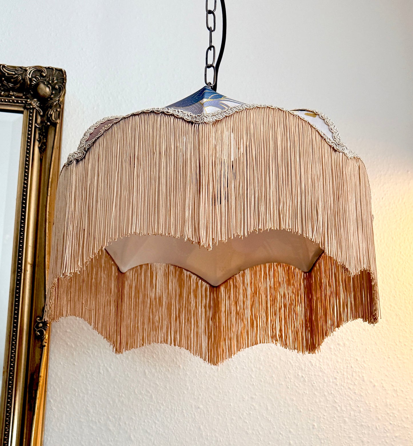 Japanese silk pendant light fixture with a textured finish on a white wall. The House of Soft Light