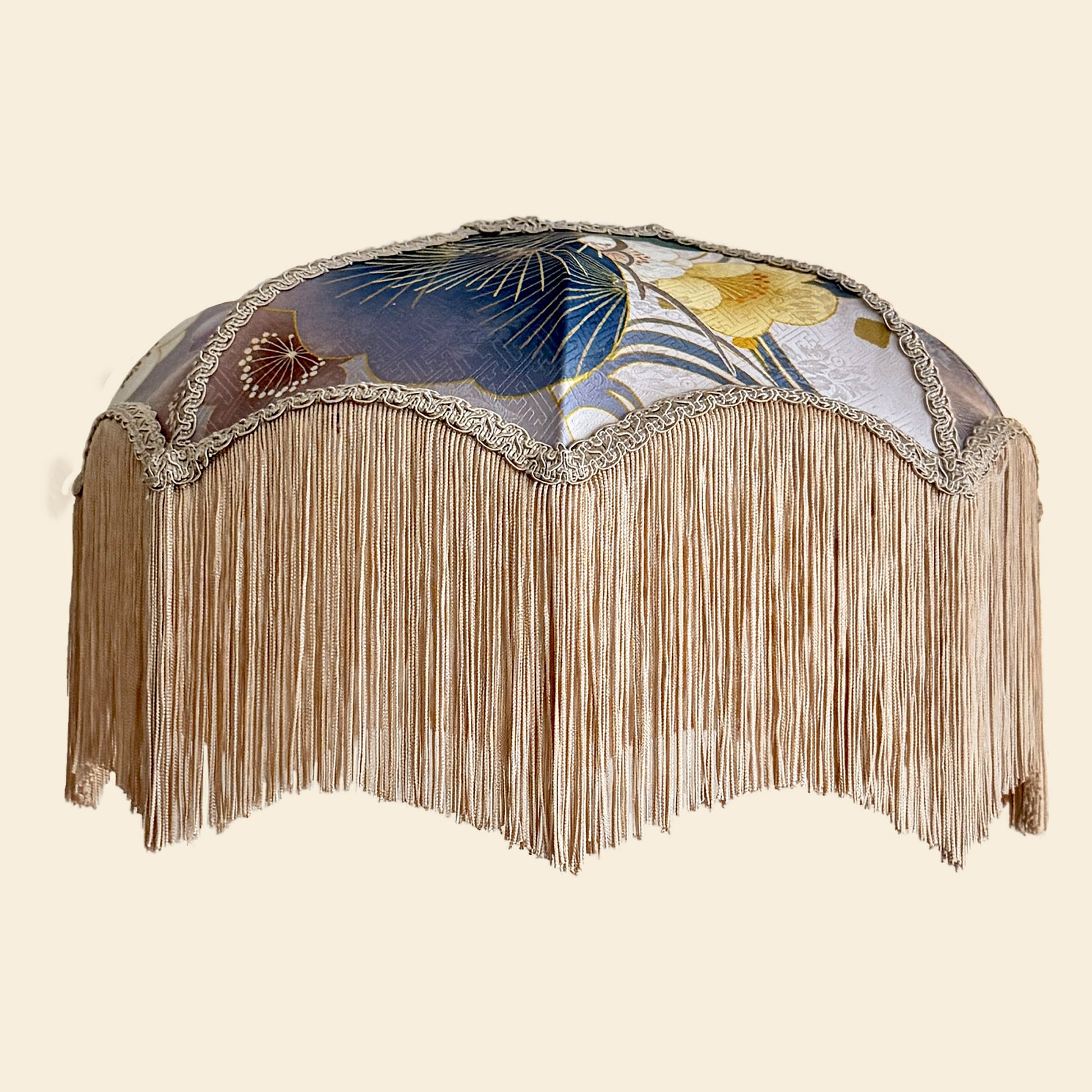 Decorative Japanese Lampshade with floral design and fringe on a beige background. The House of Soft Light