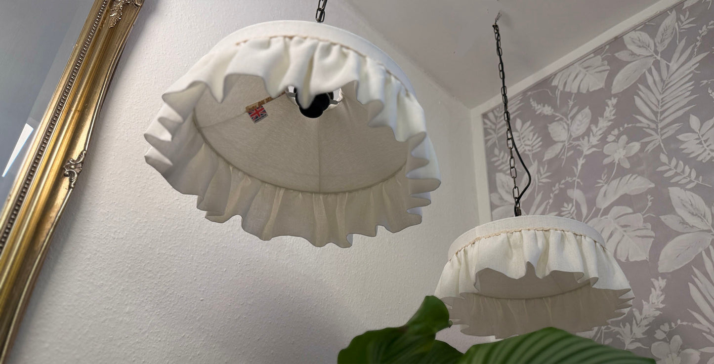 Off-white linen lampshades closer look of the lining and ruffles