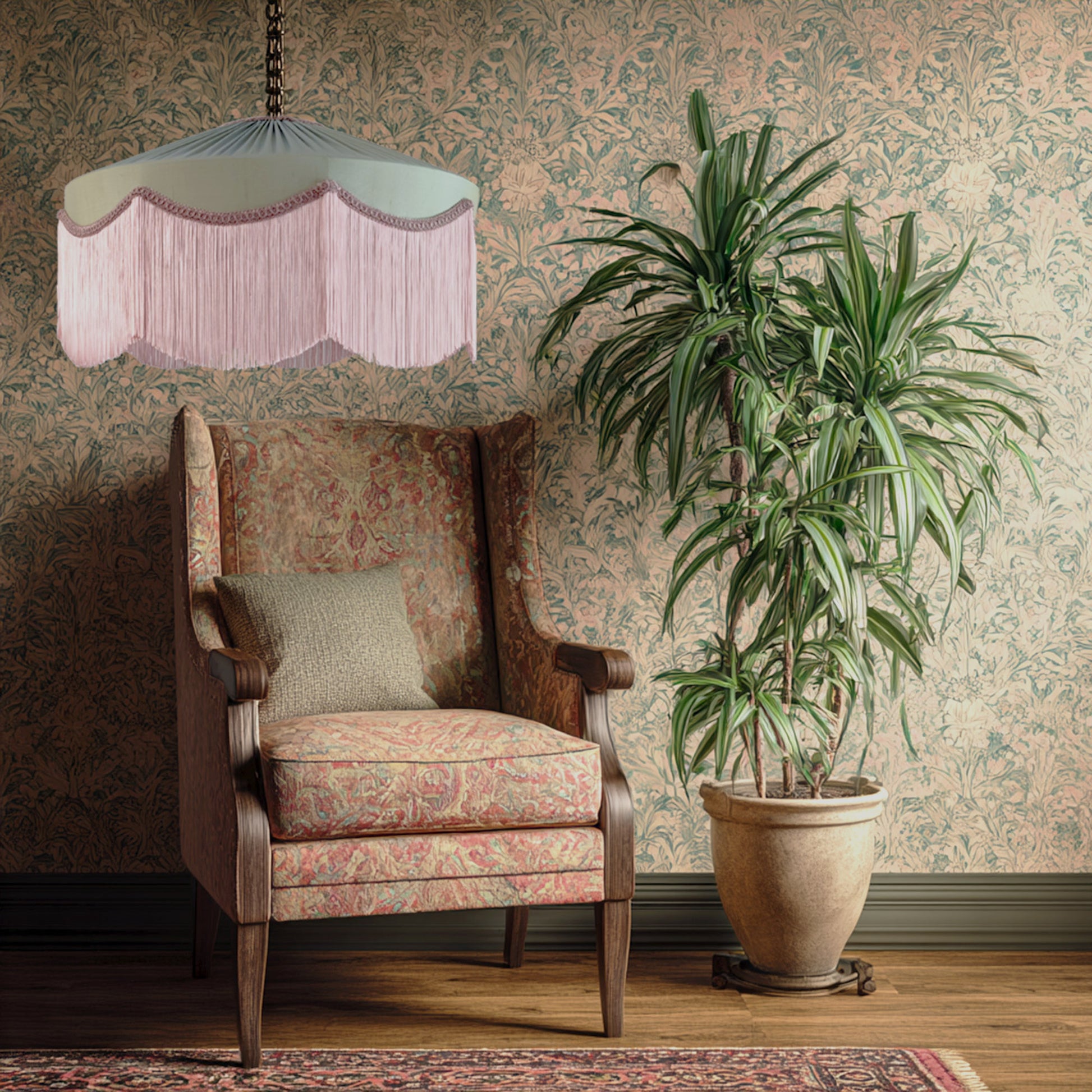Green lampshade with pink fringe hung from the ceiling 
