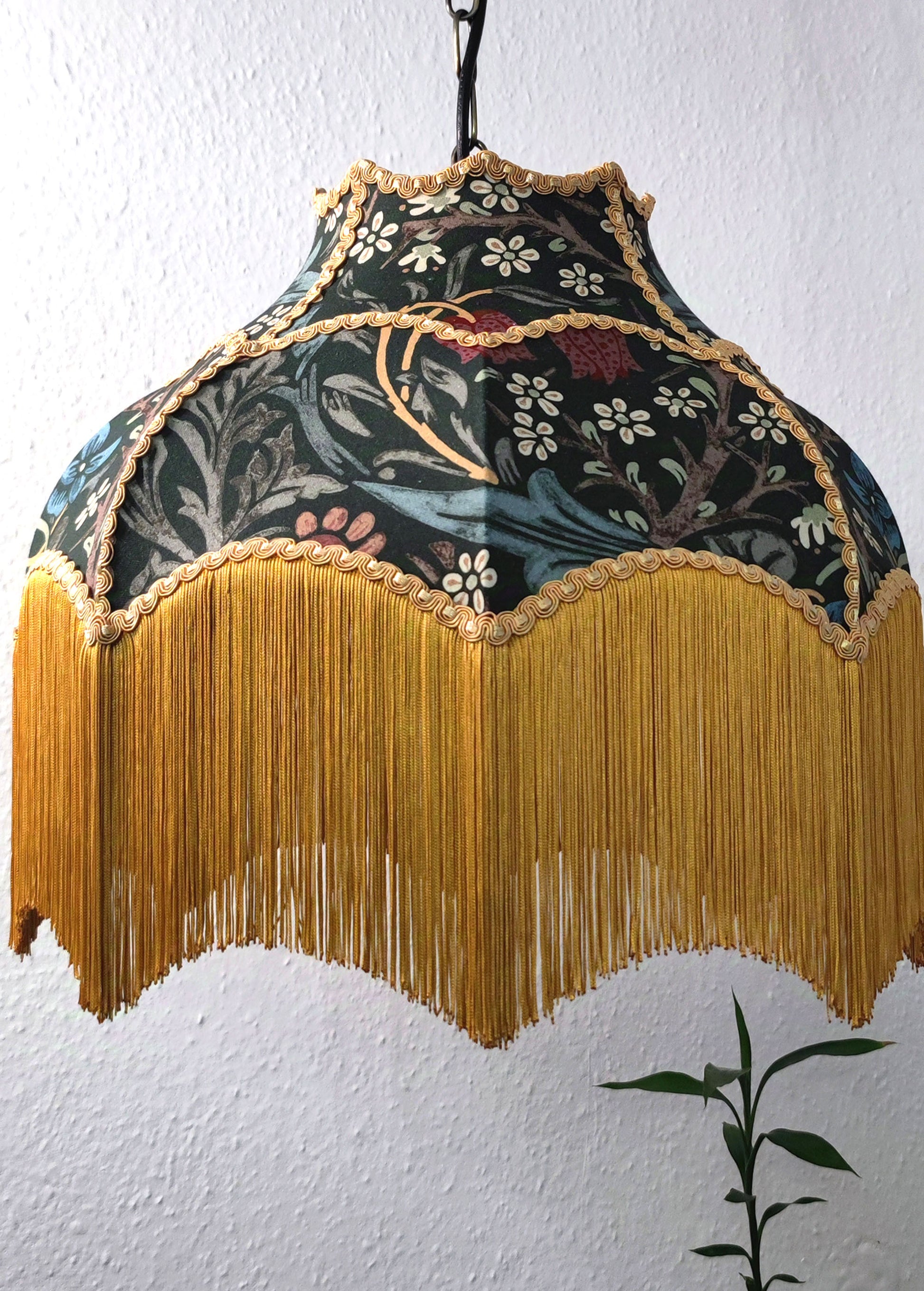 William Morris fringed lampshade Blackthorn dark green with gold trim and long fringe, ideal for vintage table or ceiling lighting décor.