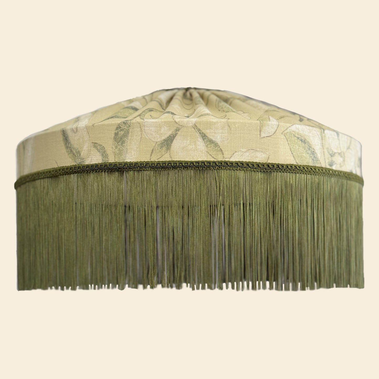 Olive green patterned lampshade made of Zoffany linen and decorated with fringe