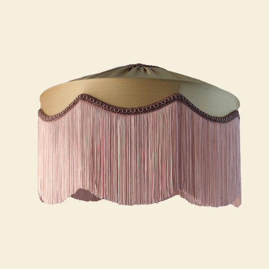 Gold silk fringed lampshade with blush fringe and decorative trim, ideal for Art Deco or vintage-inspired luxury lighting in elegant interiors.