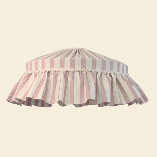 Handmade ruffle lampshade in dusty pink striped cotton with pleated trim, ideal for table or ceiling light in romantic or cottage-core interiors.